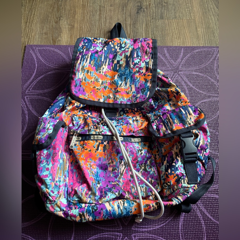 LeSportSac multicolored backpack with drawstring and clasp closures and pockets